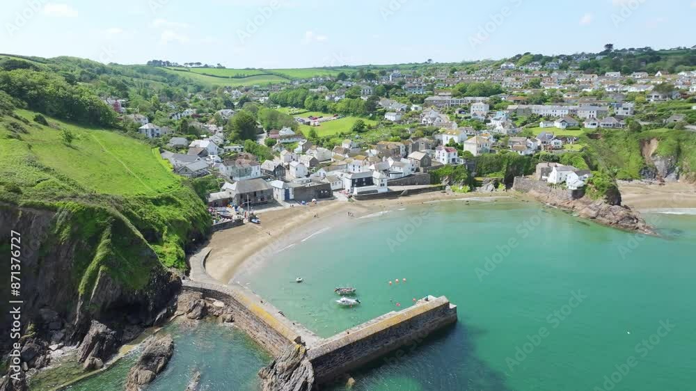 Gorran Haven Town in Cornwall with Turquoise Waters Along the Beach in the Summer, UK. Gorran Haven Town in Cornwall with Turquoise Waters Along the Beach in the Summer, UK.
