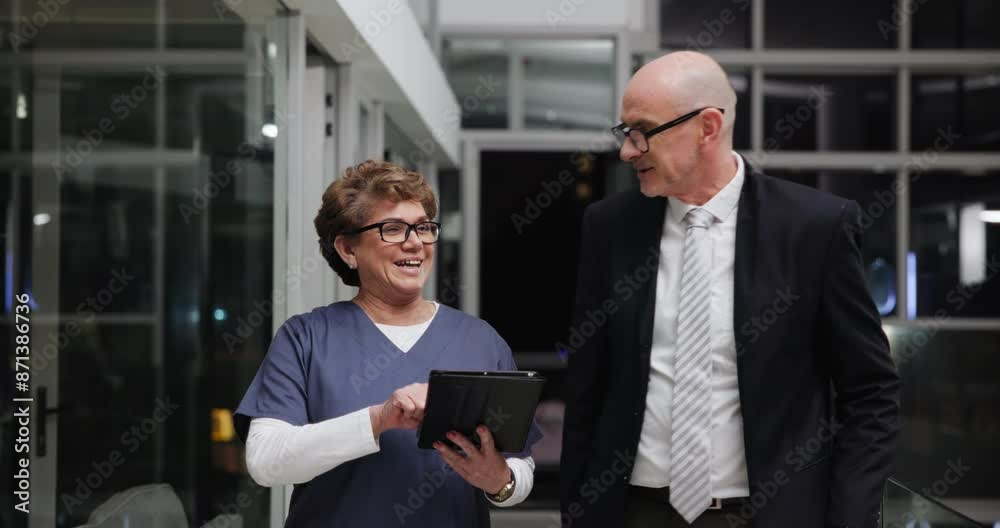 Walking, CEO and nurse with tablet, talking and discussion of shortage of staff in hospital and healthcare. Clinic, boss and woman in hallway, online and info of timesheet to show man of overtime