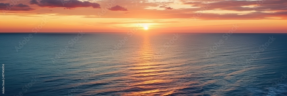 Obraz premium Golden Hour Sunset Over the Ocean, A stunning sunset over the vast ocean, A breathtaking sunset over the vast ocean