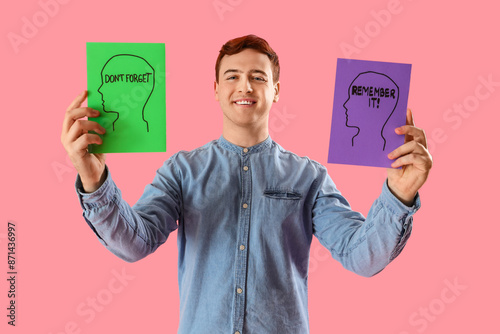 Young man with reminders on...