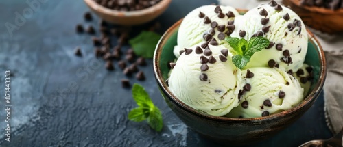 Mint chocolate chip ice cream combines refreshing mintflavored ice cream with crunchy chocolate chips, creating a delightful contrast photo