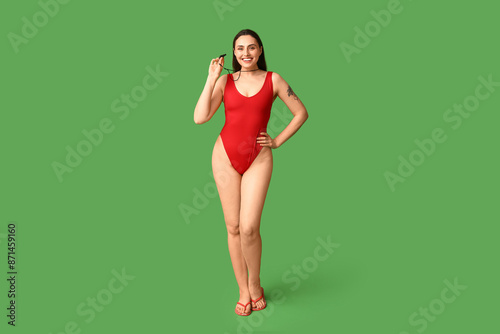 Female lifeguard with whist...