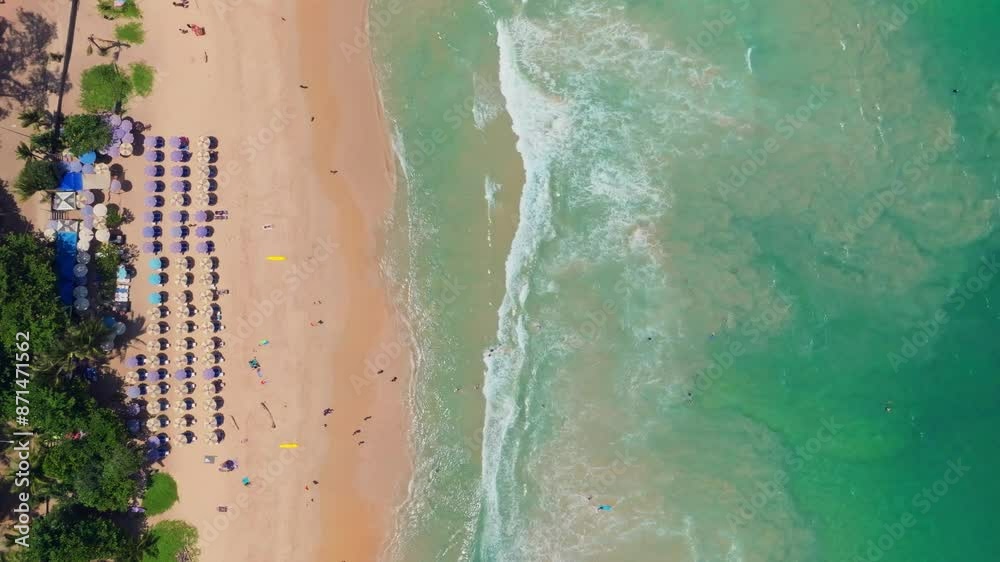 Beautiful sea summer landscape, Waves sea water surface High quality video Bird's eye view, Drone top view waves crashing on sand beach,Nature ocean sea beach background Beautiful sea summer landscape, Waves sea water surface High quality video Bird's eye view, Drone top view waves crashing on sand beach,Nature ocean sea beach background