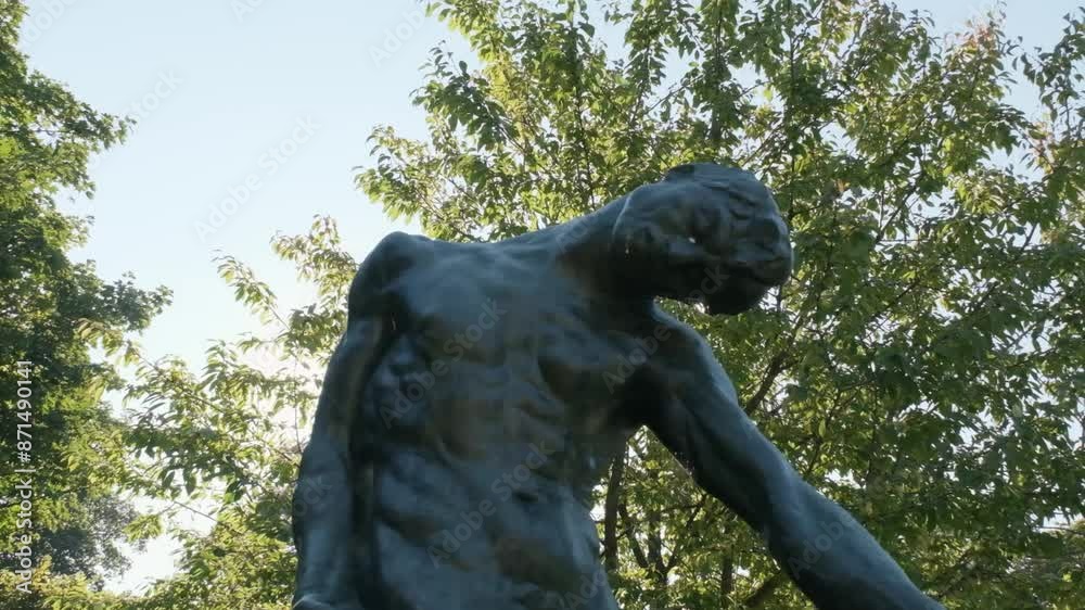 Sun glowing on an Auguste Rodin statue in Paris Sun glowing on an Auguste Rodin statue in Paris