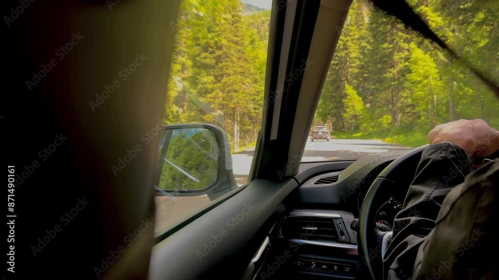 Drivers view of Montana Mountain during daytime. Drivers view of Montana Mountain during daytime.