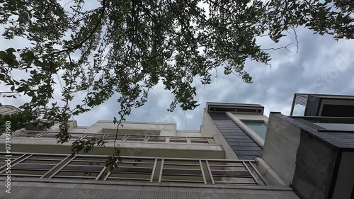 Wallpaper Mural Low Angle View of a Modern Building Against a Cloudy Sky in India Torontodigital.ca