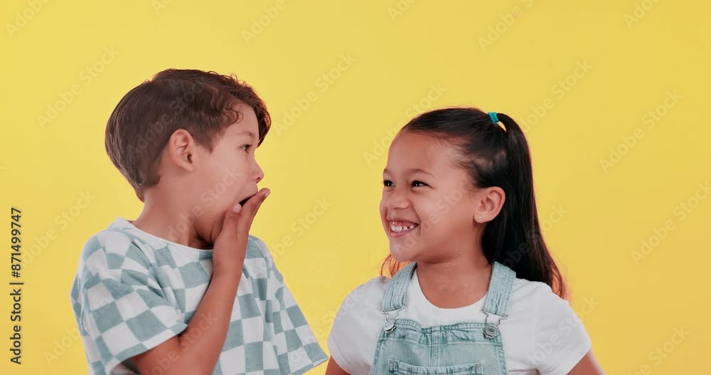 Girl, boy and children with whisper in surprise, studio and wow for story, secret and excited by yellow background. Kids, friends and listen to gossip with news, chat and playful with alert for info Girl, boy and children with whisper in surprise, studio and wow for story, secret and excited by yellow background. Kids, friends and listen to gossip with news, chat and playful with alert for info