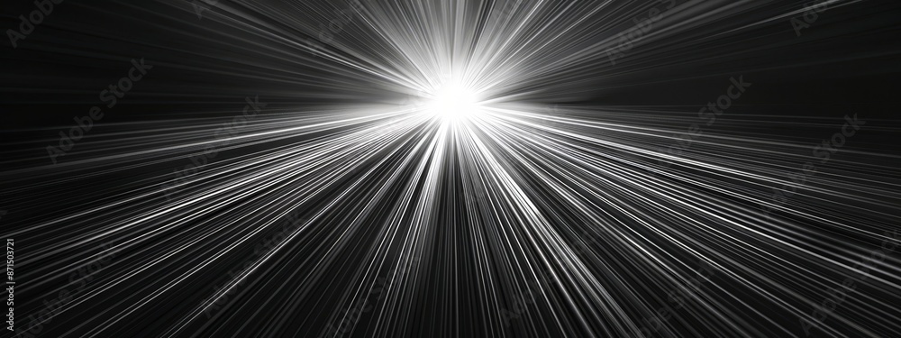 A black-and-white image of a starburst in the night sky, featuring a brilliant light emanating from its core