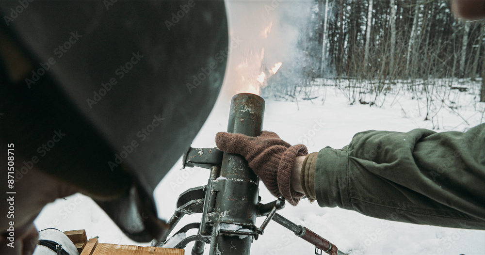 Mortar Shooting Explosions Forest. Close-up View On Re-enactors Dressed As American Infantry Soldiers Fire From Mortar. Usa Army Soldiers Of World War Ii. Reconstruction Defense Battles. Heroes Of War