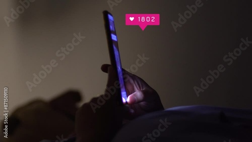 Hand using smartphone with comment ,news, friends and likes icons. social media concept