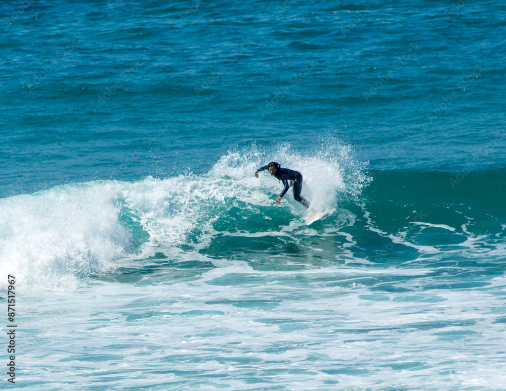 professional surfer riding waves, men catching waves in ocean, isolated. Surfing action water board sport. people water sport lessons and beach swimming activity on summer vacation professional surfer riding waves, men catching waves in ocean, isolated. Surfing action water board sport. people water sport lessons and beach swimming activity on summer vacation