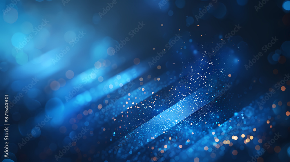 Fototapeta premium Abstract blue background with dynamic light streaks and shimmering particles.