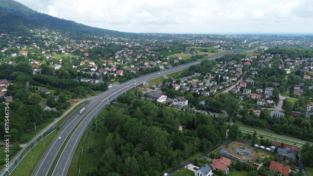 Obraz premium Bielsko-Biala Town in Green Beskidy Mountains Aerial View