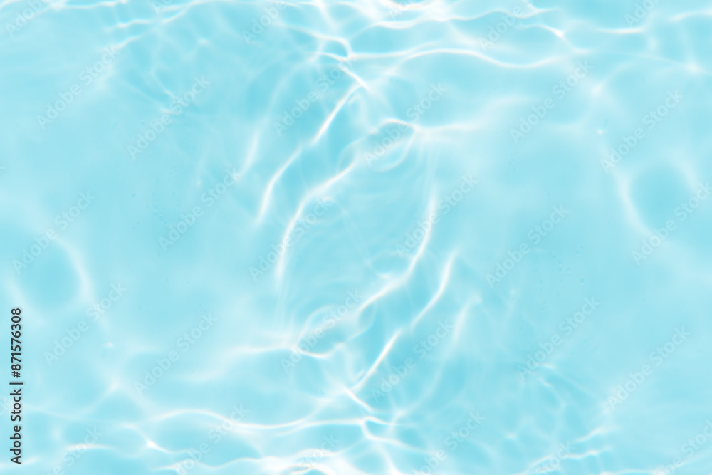 Blue water with ripples on the surface. Defocus blurred transparent blue colored clear calm water surface texture with splashes and bubbles. Water waves with shining pattern texture background. Blue water with ripples on the surface. Defocus blurred transparent blue colored clear calm water surface texture with splashes and bubbles. Water waves with shining pattern texture background.