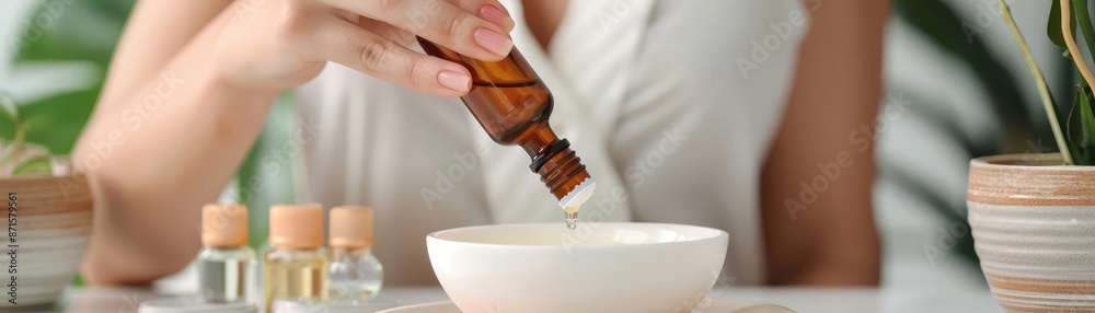 Woman using aromatherapy with essential oils at home, relaxation, sensory techniques and mental balance Woman using aromatherapy with essential oils at home, relaxation, sensory techniques and mental balance