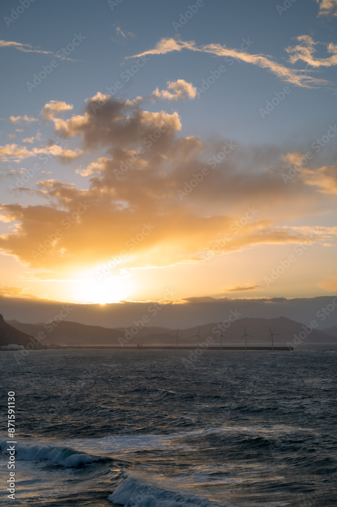 sunset over the viscay sea in the Basque Country with windmill sunset over the viscay sea in the Basque Country with windmill