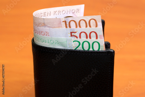 Swedish crown in the black wallet