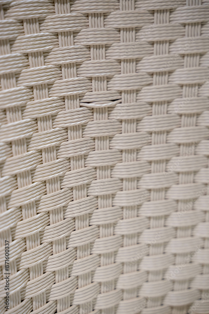 A beautifully crafted weaving pattern showcases its intricate and geometric design, blending traditional craftsmanship with modern aesthetics. The interlaced threads form a symmetrical and detailed A beautifully crafted weaving pattern showcases its intricate and geometric design, blending traditional craftsmanship with modern aesthetics. The interlaced threads form a symmetrical and detailed