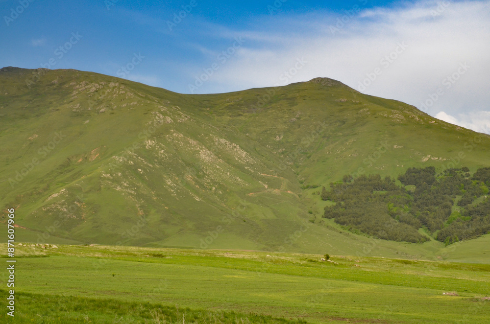 Ughtanist Mount and Tsaghkunyats mountain range in spring scenic view from Aparan-Spitak highway (Aragatsotn Province, Armenia) Ughtanist Mount and Tsaghkunyats mountain range in spring scenic view from Aparan-Spitak highway (Aragatsotn Province, Armenia)