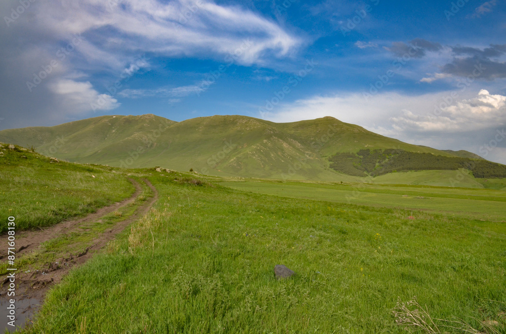Ughtanist Mount and Tsaghkunyats mountain range in spring scenic view from Aparan-Spitak highway (Aragatsotn Province, Armenia) Ughtanist Mount and Tsaghkunyats mountain range in spring scenic view from Aparan-Spitak highway (Aragatsotn Province, Armenia)