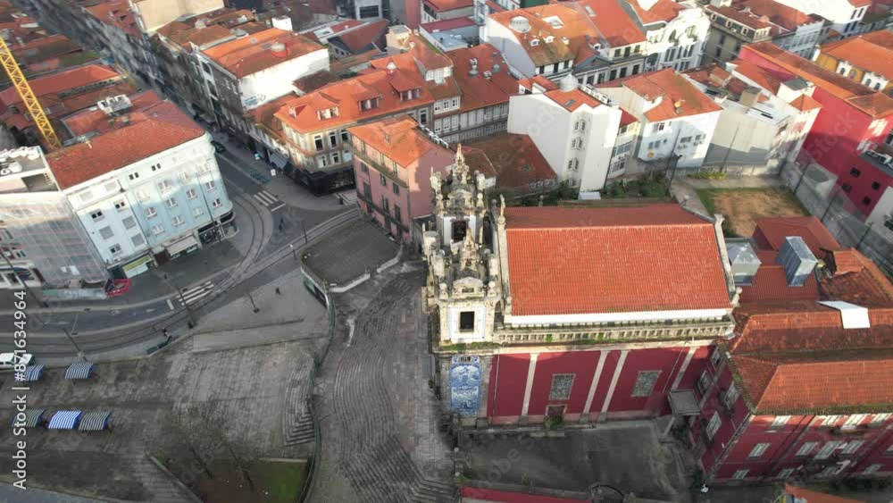 Circle Aerial video of the beautiful Portuguese church with azulejo tiles - Igreja de Santo Ildefonso in Porto city, Portugal