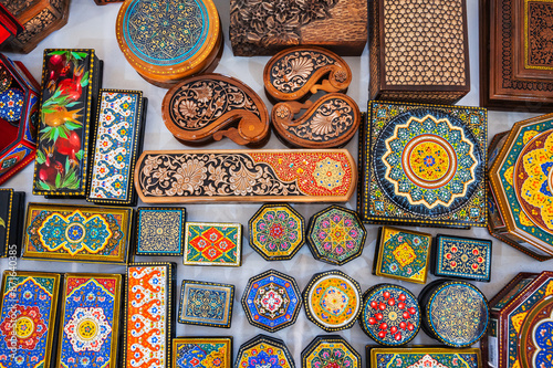 asian handmade wooden carved Uzbek caskets hand-painted in a souvenir shop in Uzbekistan in Tashkent photo