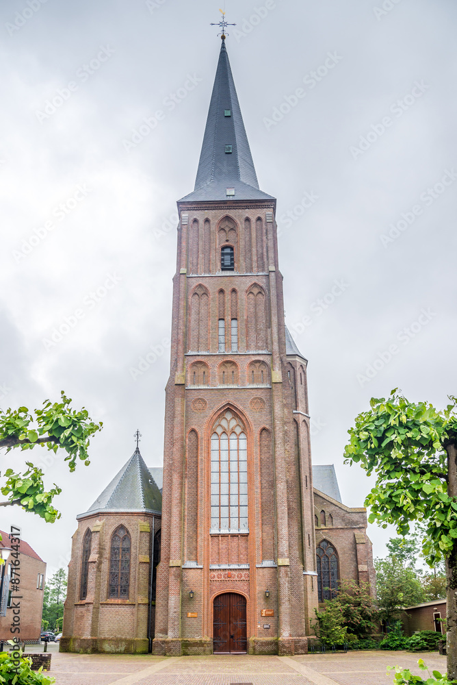 Fototapeta premium View at the Saint Cristophe church in the streets of Schagen - Netherlands