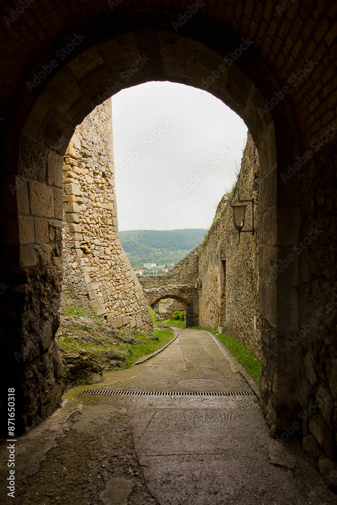Obraz premium ancient Trencin Castle in Slovakia 11th century. A wall with an archway.