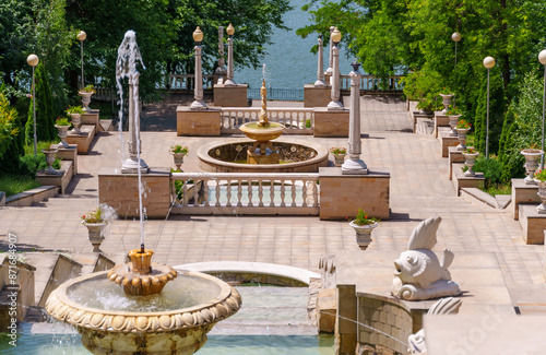 city park in summer season, beautiful view, nature with architecture and fountains