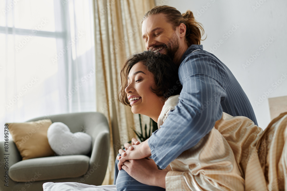 A loving couple snuggles together in bed, enjoying a moment of intimacy and affection. A loving couple snuggles together in bed, enjoying a moment of intimacy and affection.