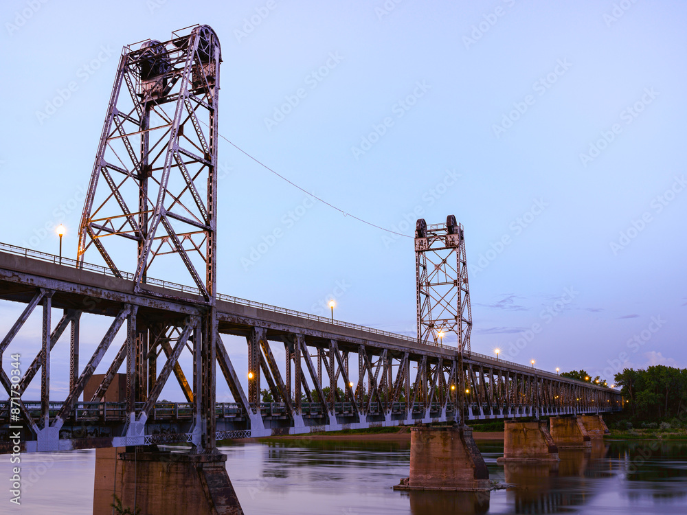 The Meridian Bridge across the Missouri River in Yankton: The Signature Landmark 3,013 feet long double-deck bridge, opened in 1924, connecting Nebraska and South Dakota The Meridian Bridge across the Missouri River in Yankton: The Signature Landmark 3,013 feet long double-deck bridge, opened in 1924, connecting Nebraska and South Dakota
