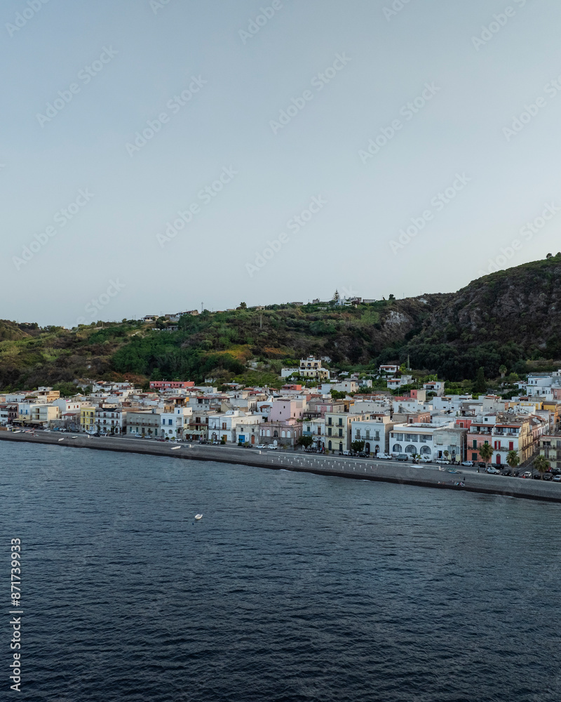 Aerial view of Canneto small town along the Mediterranean coastline, Lipari, Aeolian Islands archipelagos, Sicily, Italy. Aerial view of Canneto small town along the Mediterranean coastline, Lipari, Aeolian Islands archipelagos, Sicily, Italy.