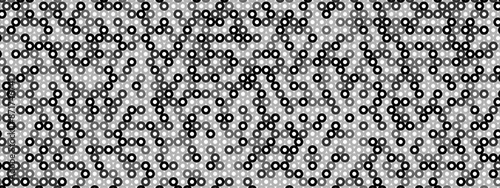 Halftone abstract background of hollow dots. Mosaic texture of random particles. Chaotic ornament. Linear pattern. Design of banner, poster on website, social networks. Vector illustration