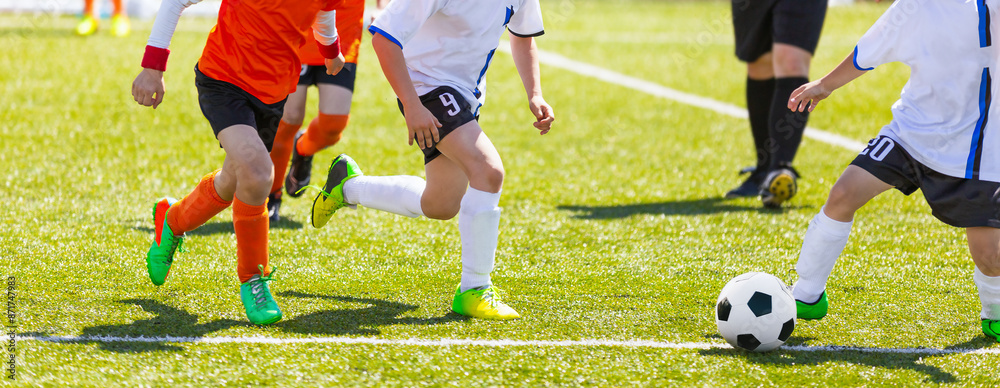 Obraz premium Kids Kicking Soccer School Tournament Match. Children Playing Sports Game. Running European Footballers. Young Athletes Compete in Football Game