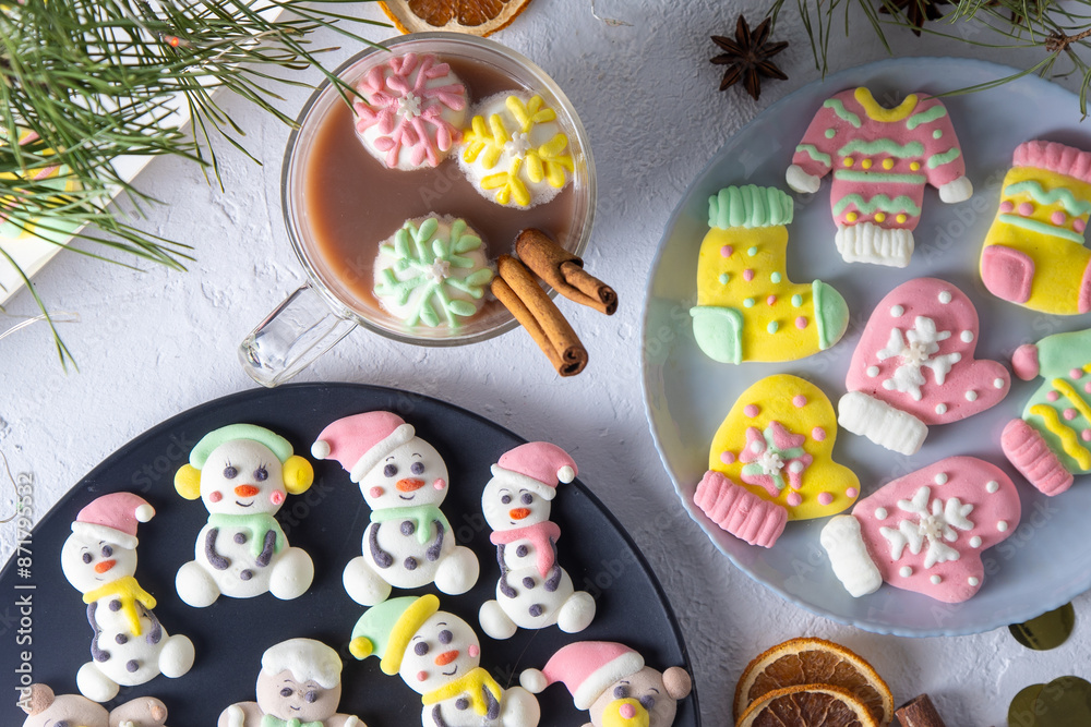 Christmas marshmallows. Winter candy. Sweet food in december. Snowman and Santa Claus Christmas marshmallows. Winter candy. Sweet food in december. Snowman and Santa Claus