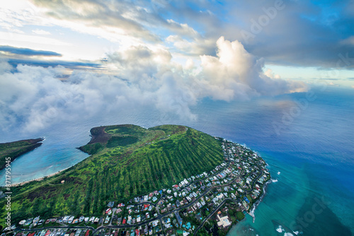 Aerial view of Portlock Cloudburst beach with vibrant reef and lush greenery, Hawaii, United States. photo