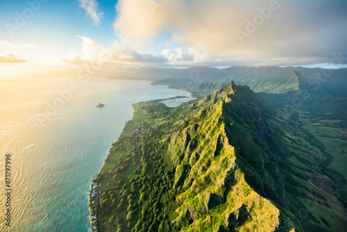 Aerial view of dramatic cliffs and lush landscape along Kualoa Ridgeline, Hawaii, United States. photo