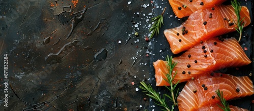Background with slices of smoked salmon and butterfish fillet with copy space image. photo