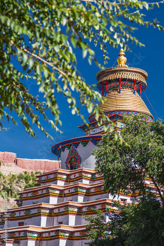 Bodhi Pagoda of Palcho Monastery(also named baiju Monastery) in Tibet, China, blue sky with copy space photo