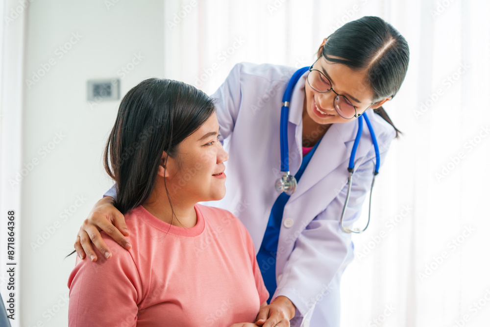 Asian female doctor nurse encouragement to a pregnant woman on a sofa, using ultrasound and stethoscope, addressing medical conditions like edema, varicose veins, and pregnancy-induced hypertension. Asian female doctor nurse encouragement to a pregnant woman on a sofa, using ultrasound and stethoscope, addressing medical conditions like edema, varicose veins, and pregnancy-induced hypertension.