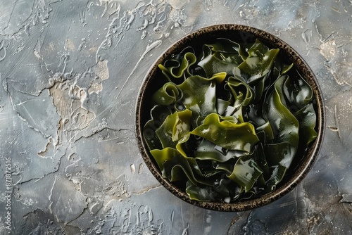 Bowl of dried seaweed on table top view