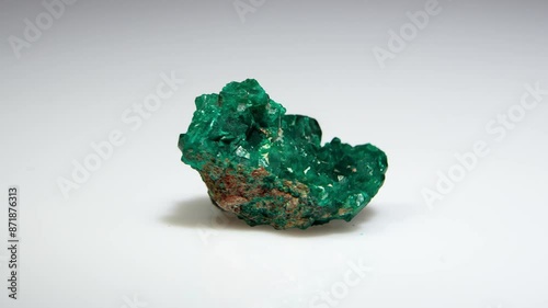 natural green dioptase crystals on the background