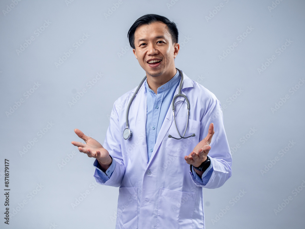 A smiling Asian male doctor in a white coat, with a stethoscope around his neck, spreads his arms wide open, conveying a welcoming and open demeanor against a light blue background A smiling Asian male doctor in a white coat, with a stethoscope around his neck, spreads his arms wide open, conveying a welcoming and open demeanor against a light blue background