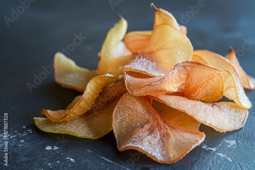 Dried pear slices coated in caramel sugar