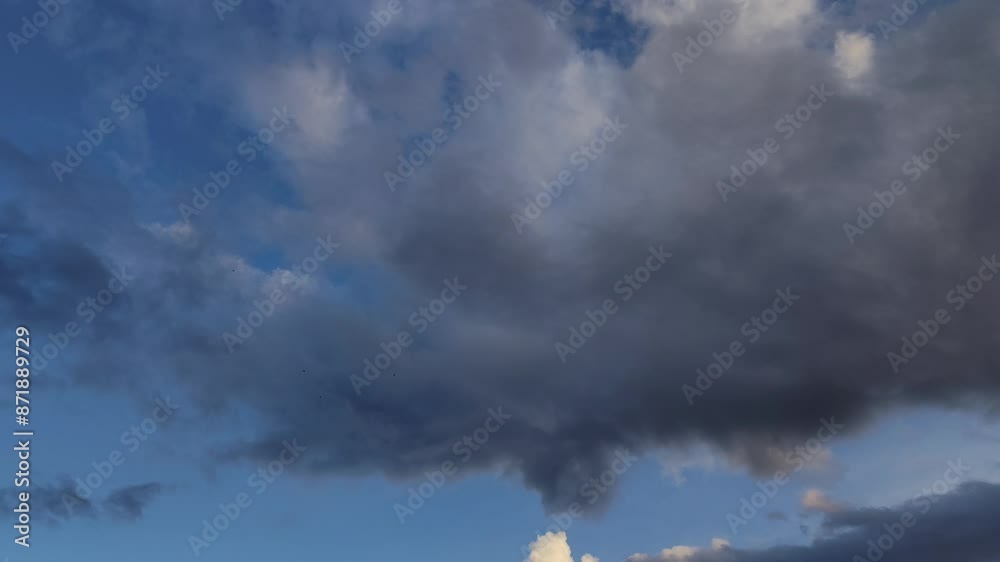 Very close-knit altocumulus cloud moving at sunset Very close-knit altocumulus cloud moving at sunset