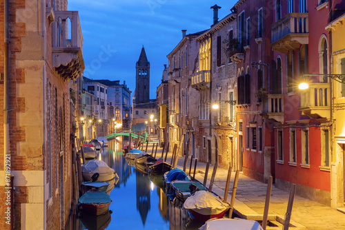 Typical Venetian canal with bridge at night, San Barnaba, Venice, Italy