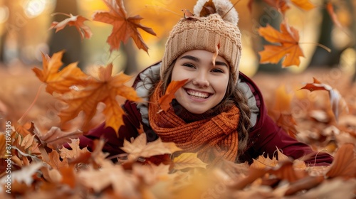 The girl among autumn leaves