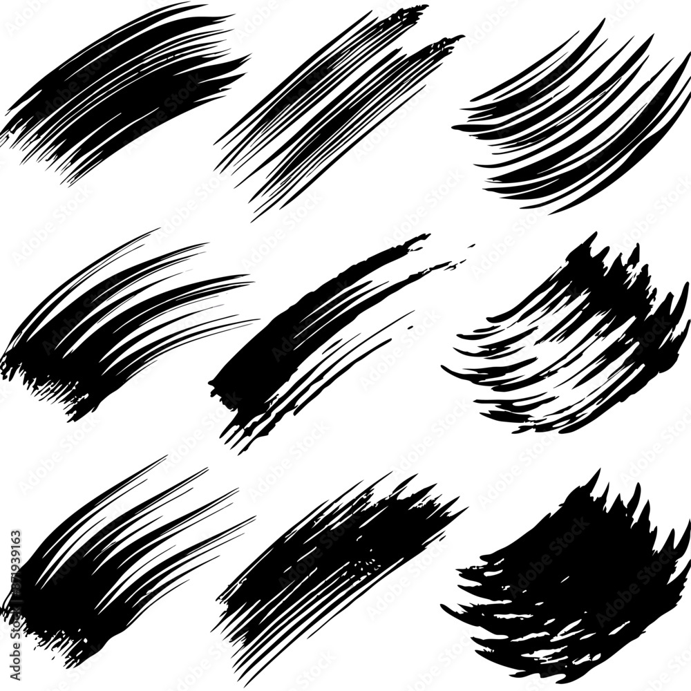 Naklejka premium A series of black brushstrokes painted on a white canvas