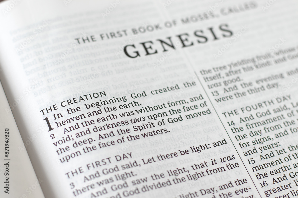 Open holy bible book of Genesis, the creation of God Jesus Christ verses. Close-up. Studying old testament Scriptures, biblical concept. Open holy bible book of Genesis, the creation of God Jesus Christ verses. Close-up. Studying old testament Scriptures, biblical concept.