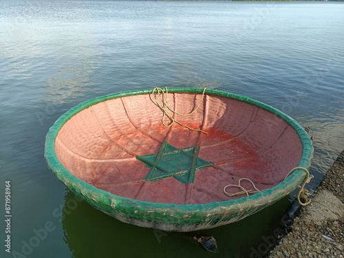 A coracle is a small, rounded, lightweight boat of the sort traditionally used in Wales, and also in parts of the western parts of Ireland, particularly the River Boyne, and in Scotland, particularly  photo